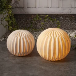 Lámpara LED para terraza Sandy, Ø 30 cm pila de plástico blanco