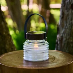 lámpara LED solar Aston Jar, altura 12 cm, negro/marrón, IP44