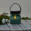 Lámpara LED solar Aston Jar, altura 12 cm, verde/marrón, IP44