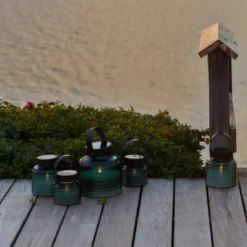 Lámpara LED solar Aston Jar, altura 12 cm, verde/marrón, IP44