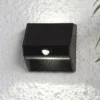 Lámpara LED solar de pared Wally con luz ascendente y downlight