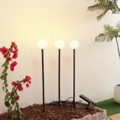 Lámpara LED solar Lindby Brindley, juego de 3, negro, cristal