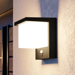Lámpara solar LED de pared Frigento, color negro, altura 15 cm, con sensor