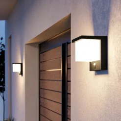Lámpara solar LED de pared Frigento, color negro, altura 15 cm, con sensor