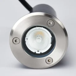 Lucande Lámpara de suelo LED empotrable Kenan, Ø 7 cm, acero inoxidable, IP67