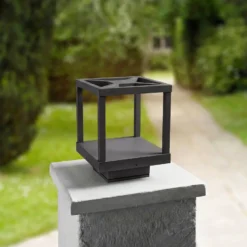 Lucande Lámpara sobremuro LED Lealan, negra, metal, 23 cm, IP54